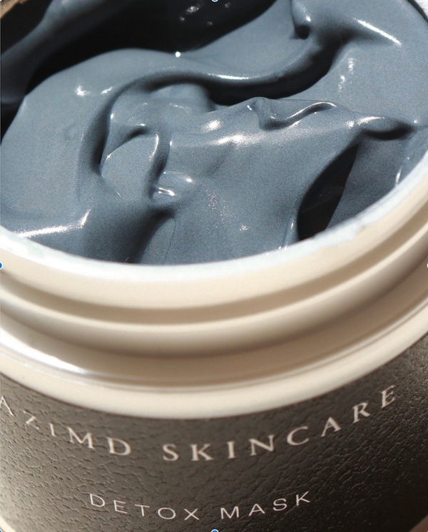 Open Jar of Black Charcoal Face Mask