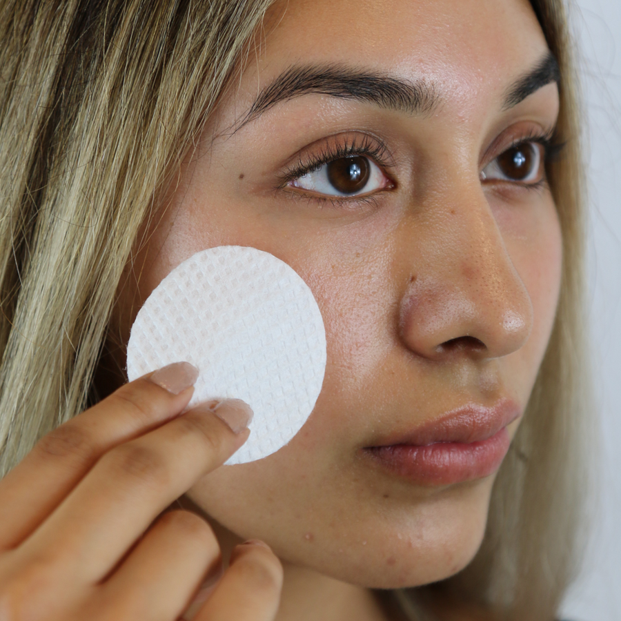 Woman Using Acne Face Pad
